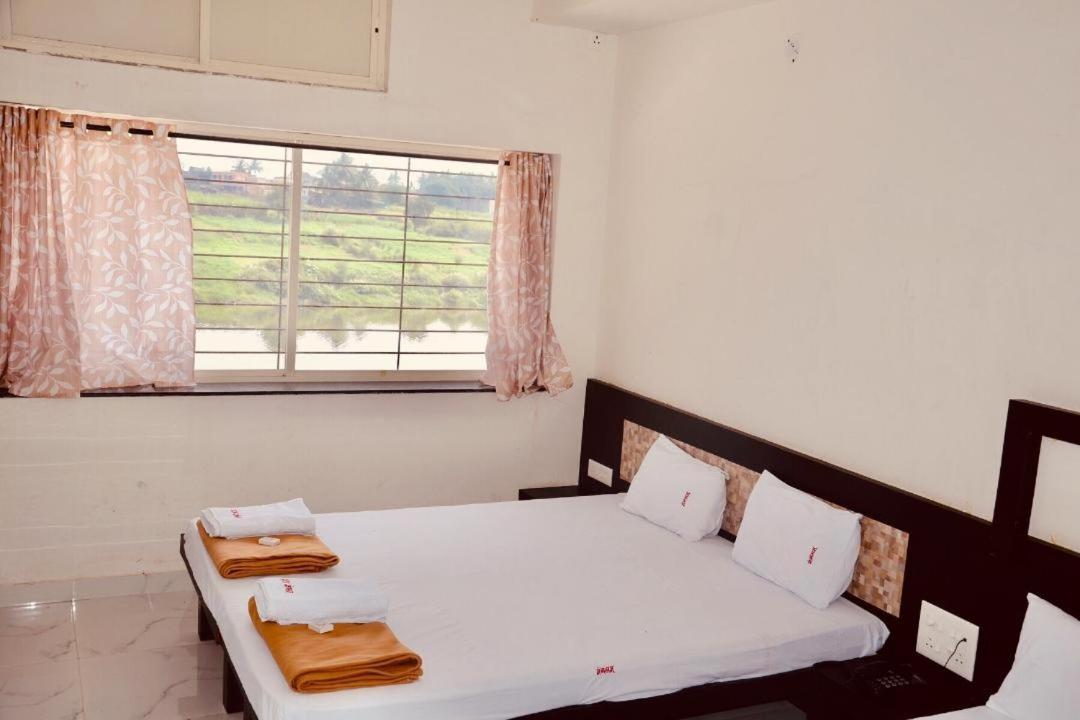 Hotel Mangalam Kurandvad Luaran gambar