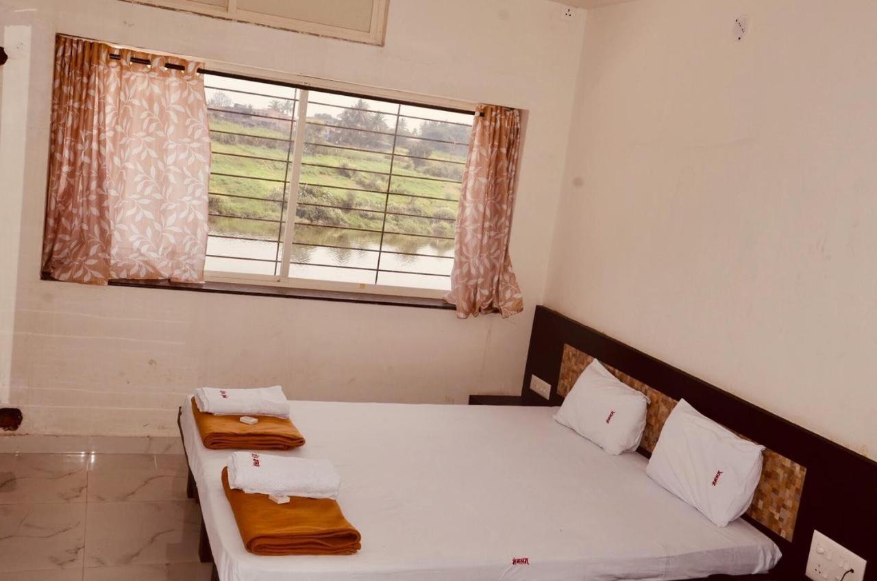 Hotel Mangalam Kurandvad Luaran gambar