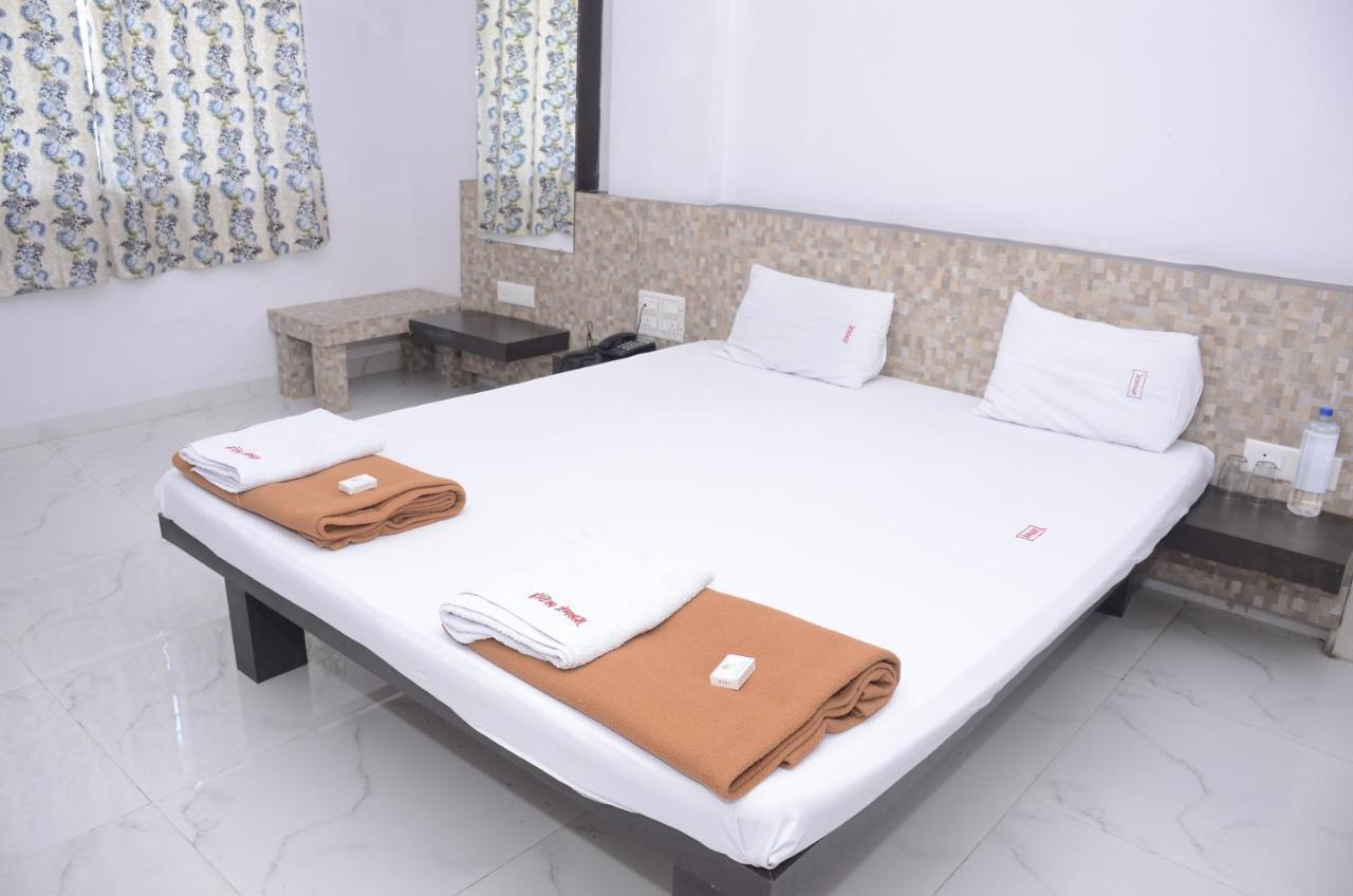 Hotel Mangalam Kurandvad Luaran gambar